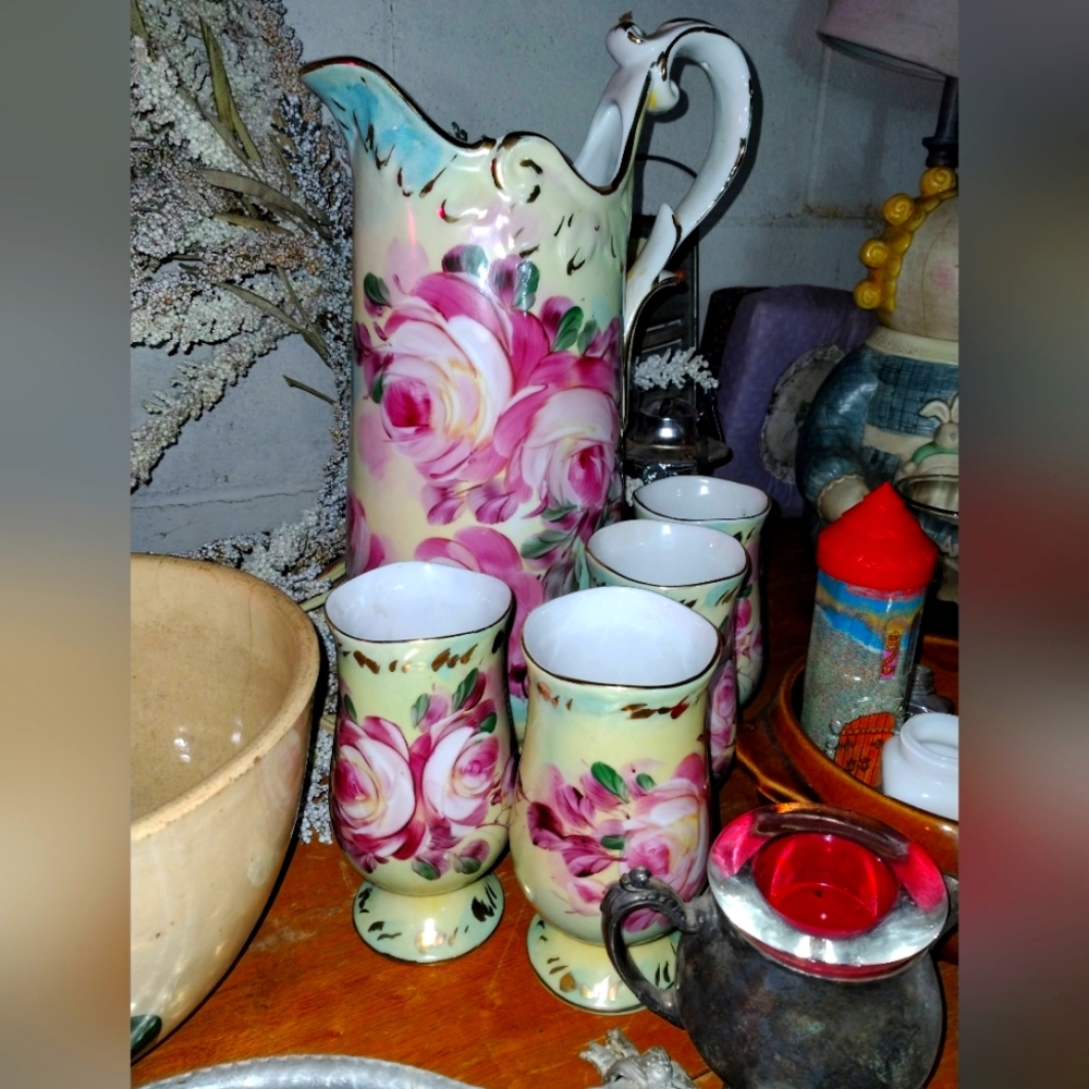Pitcher and three glasses